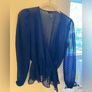 Sheer peplum blouse in navy blue